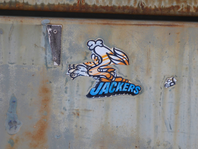 HiJackers! An old sticker on a dumpster half a block away. My old 71 Javelin had a matching sticker.